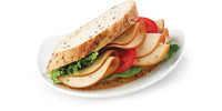 Chicken Mortadella Slices with cracked black peppercorn and pistachios K&Ns