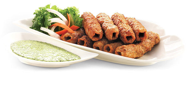 Seekh Kabab Ground chicken meat, shaped and flame grilled on skewers K&Ns